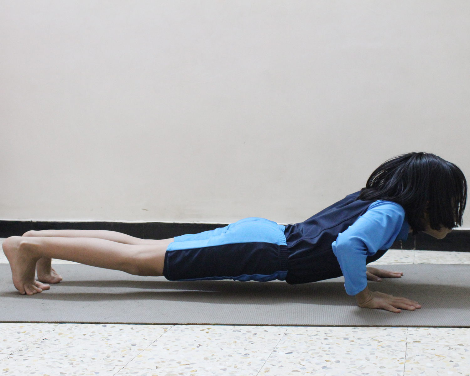 Woman doing Yoga asana Chaturanga dandasana plank pose | Stock image |  Colourbox